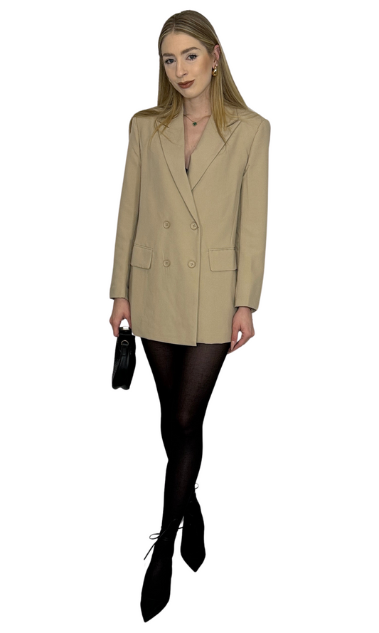 Alix oversized blazer with double-breasted front, shoulder pads, and relaxed tailored fit.