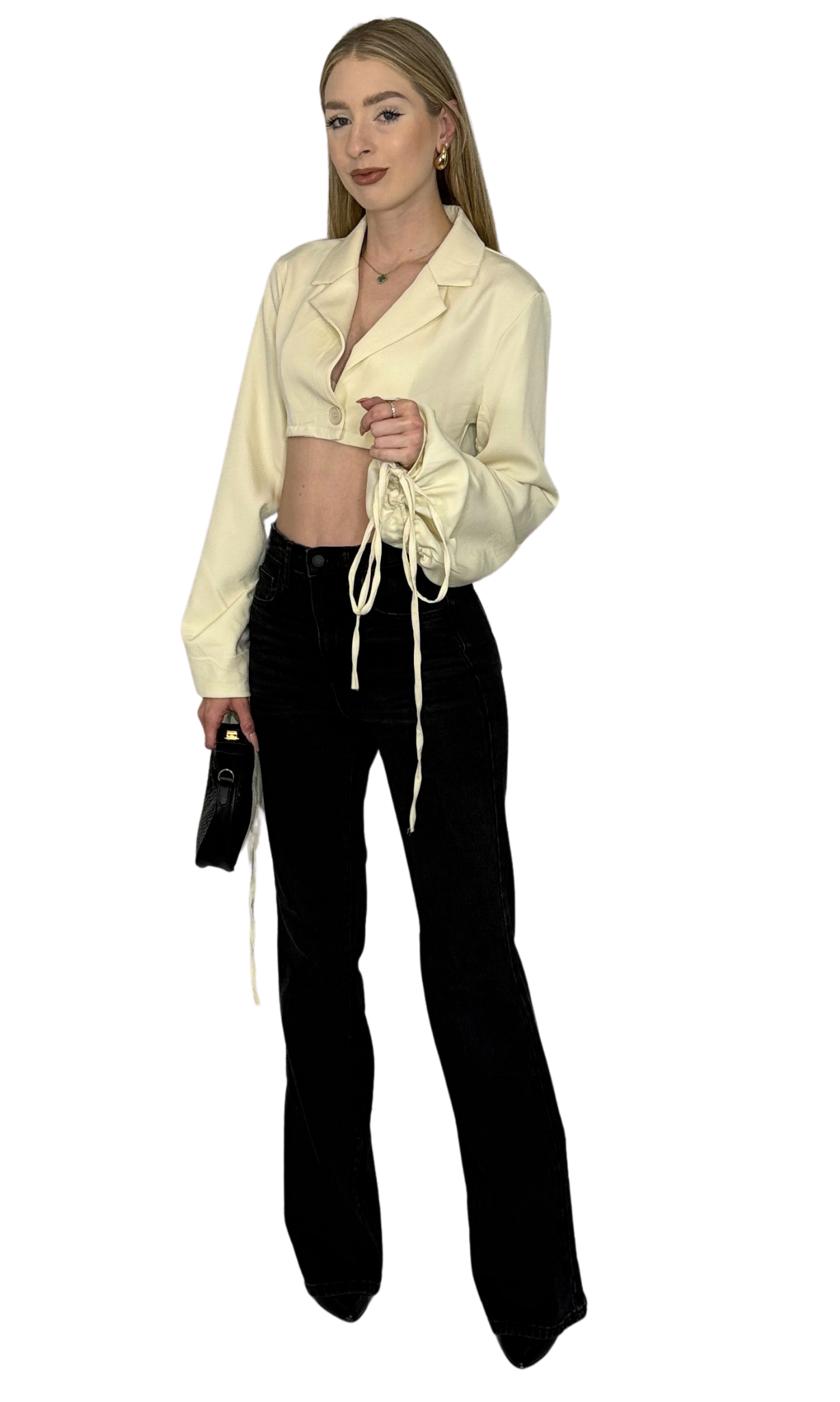 Beige cropped blazer top with oversized sleeves and drawstring detailing, offering a chic and modern twist on a classic silhouette.