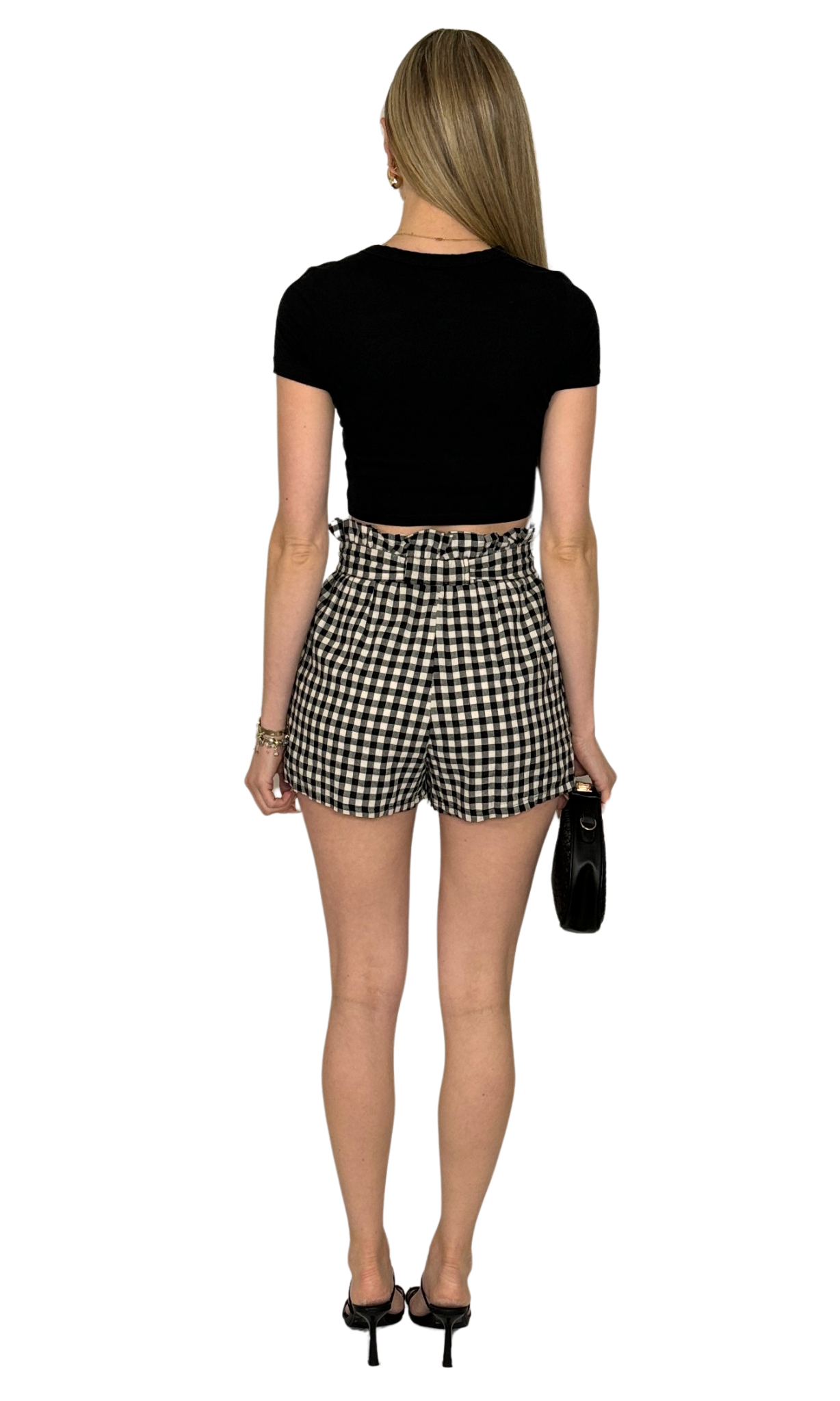 Women's black and cream checkered shorts with elastic waistband, front pockets, and tie belt sash – casual and comfortable fit