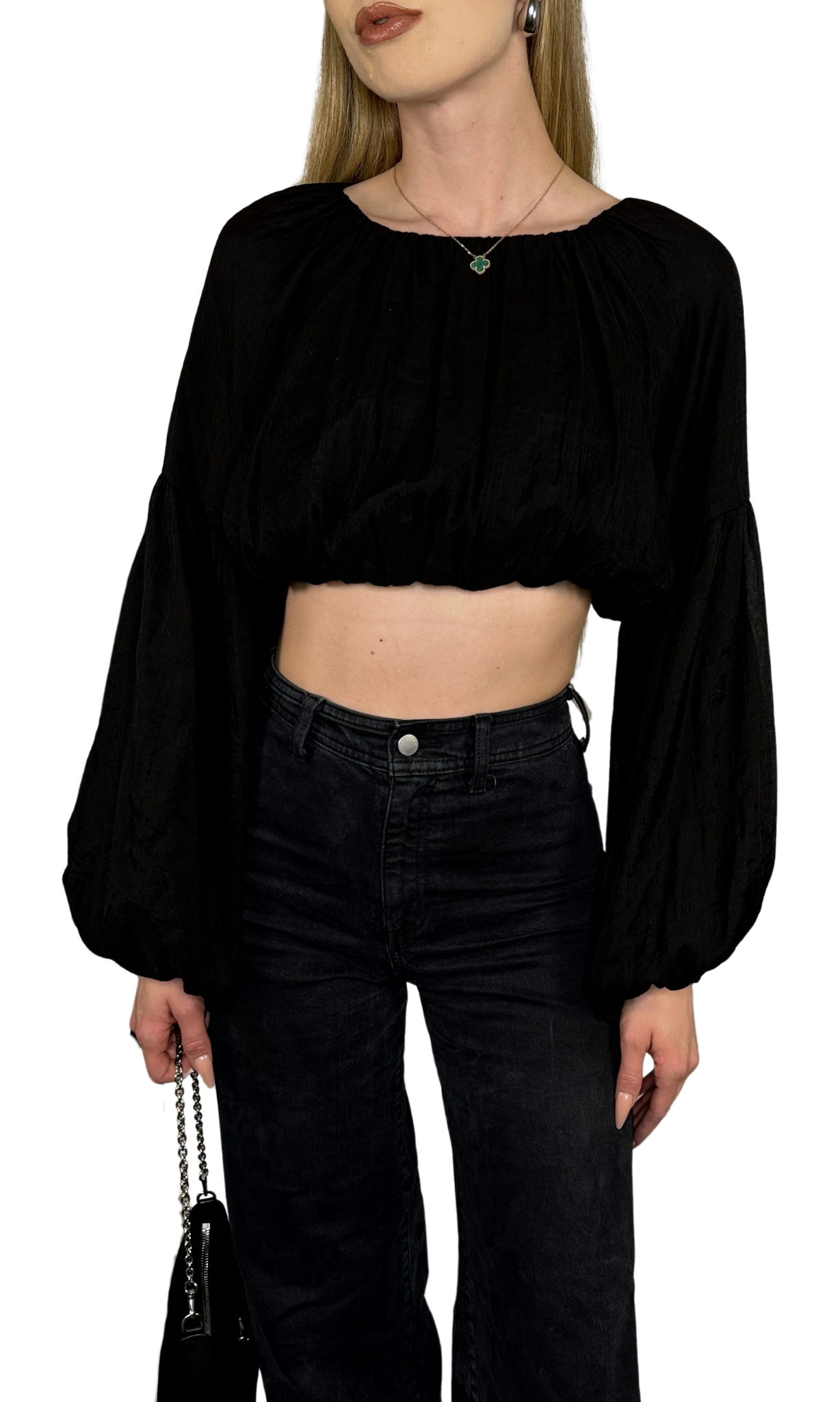 Black crop top featuring long puff sleeves with elastic at the bottom for a balloon effect, made from soft, comfortable fabric ideal for day-to-day wear with stylish sleeve shaping.