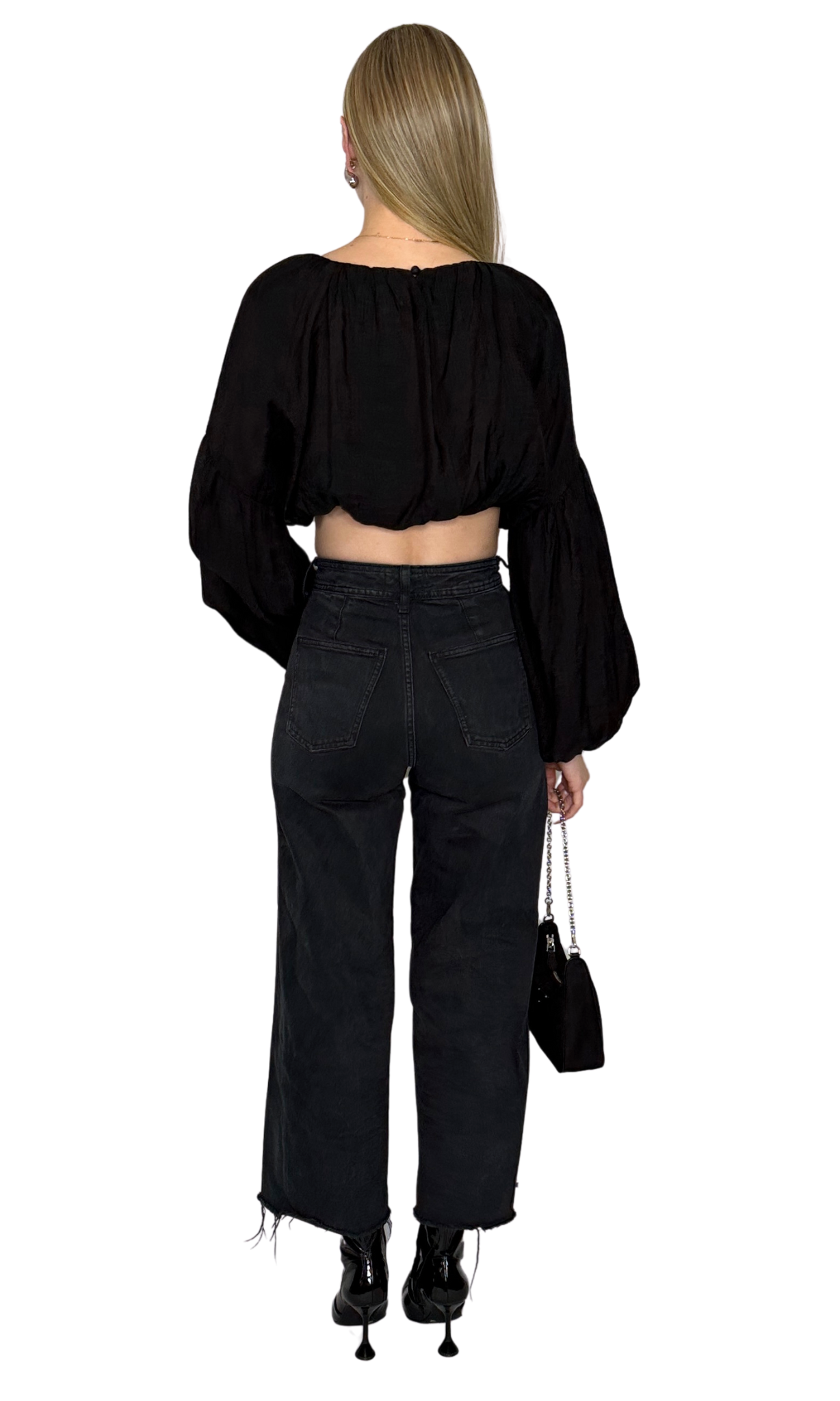 Black crop top featuring long puff sleeves with elastic at the bottom for a balloon effect, made from soft, comfortable fabric ideal for day-to-day wear with stylish sleeve shaping.