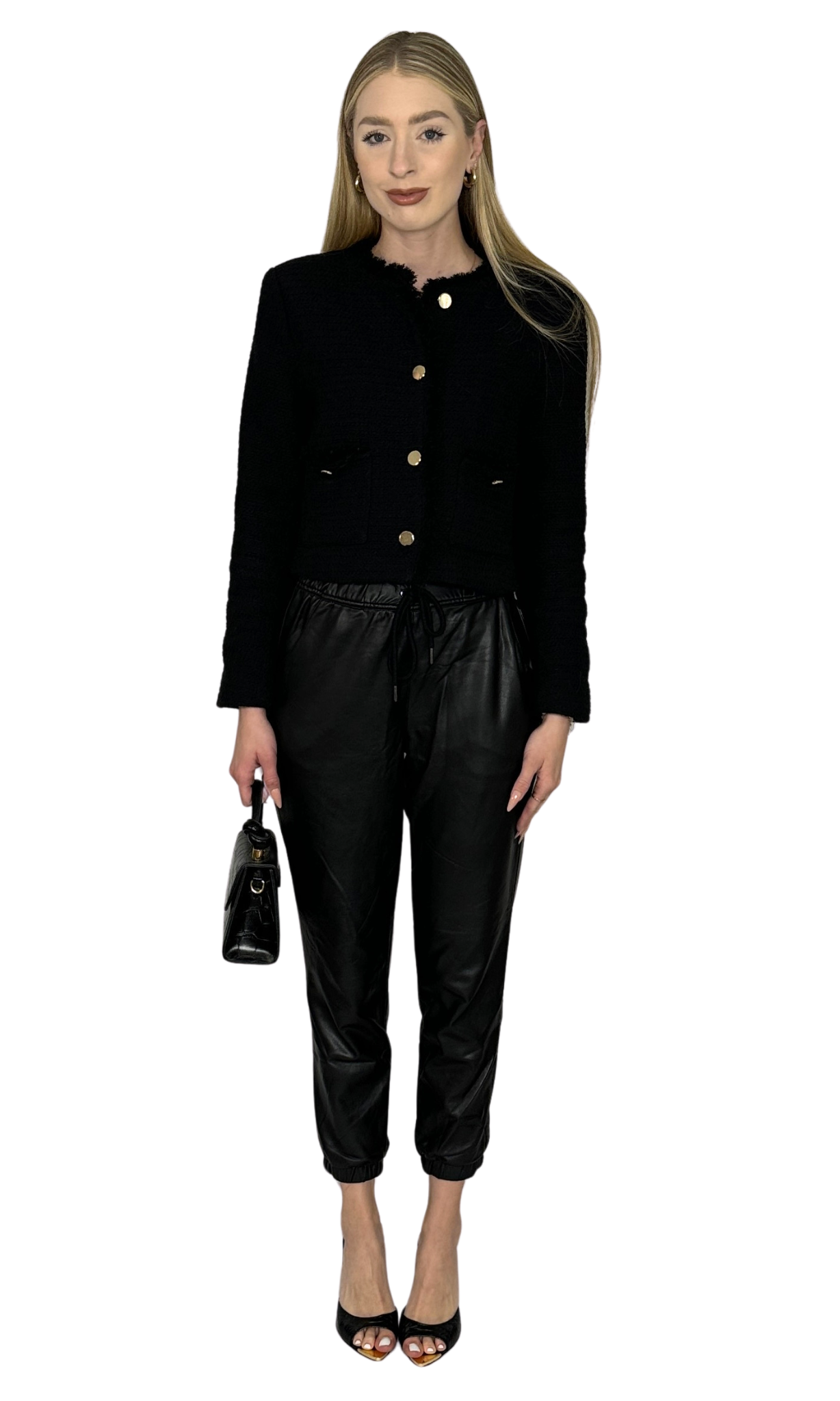 Women's black faux leather jogger pants with drawstring waist, gathered ankles, and front pockets – stylish and comfortable fit