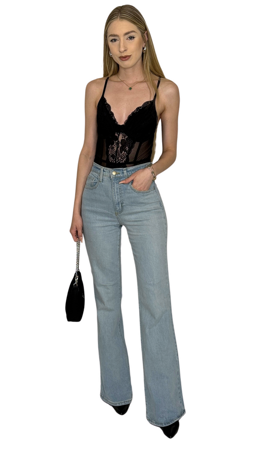 Black mesh bodysuit featuring intricate lace details, wire cups, thong cut with snap closure, and adjustable straps for a comfortable fit and elegant style — the Iris Lace Bodysuit.