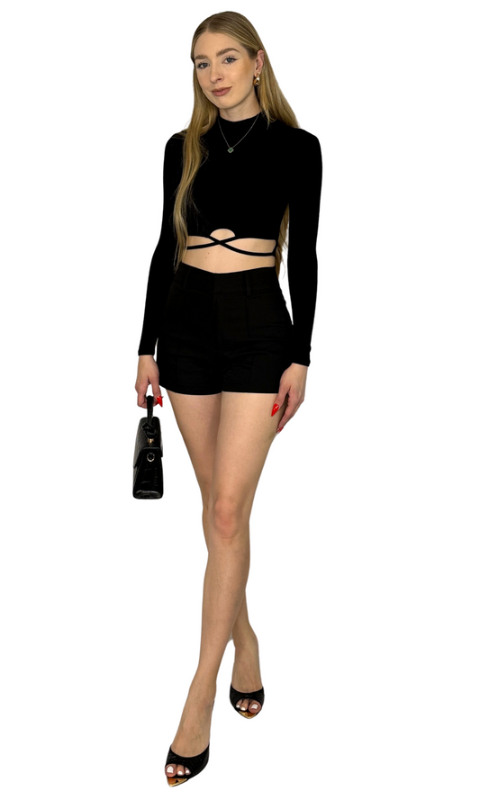 Black long sleeve top with a mock neckline and criss cross string detail on the front, combining comfort with a bold, statement-making design.