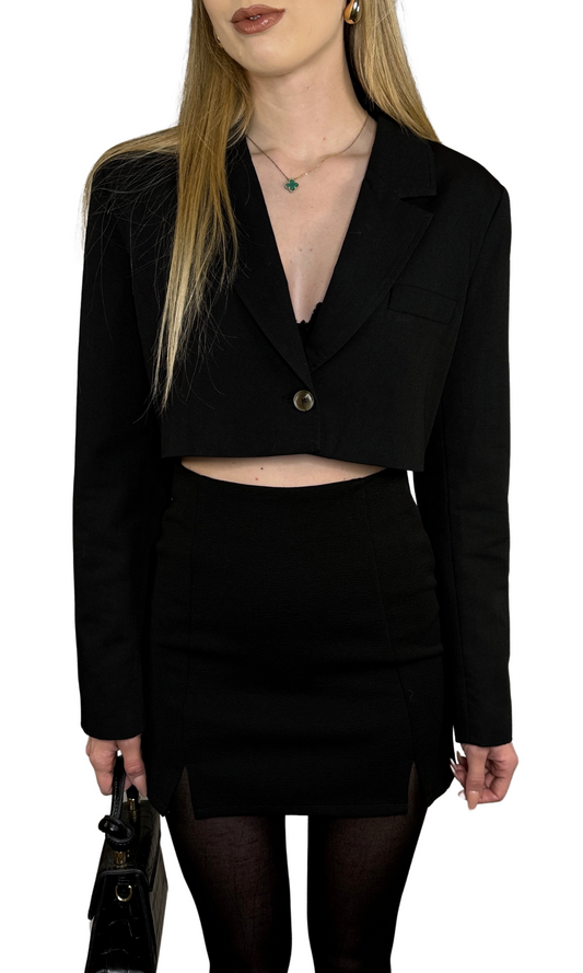Black oversized cropped blazer made from soft, lightweight fabric with classic tailoring for a timeless, comfortable, and stylish look.