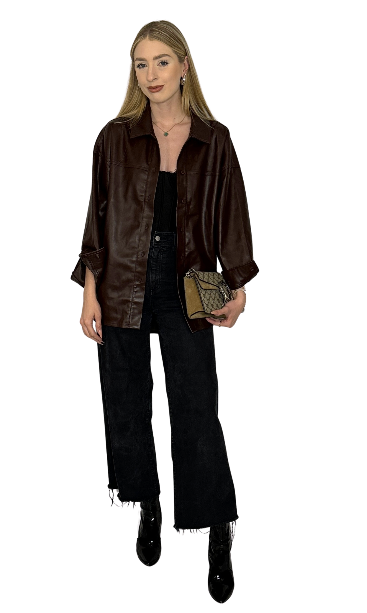 Dark brown faux leather button-down shirt with a longer back rounded hem, soft leather-like feel, and versatile styling options.