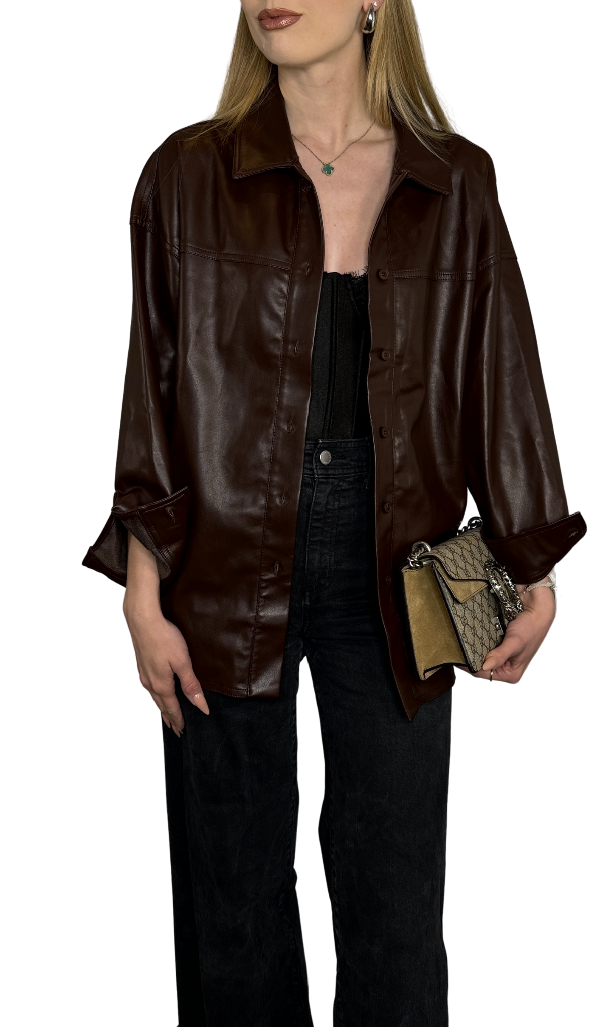 Dark brown faux leather button-down shirt with a longer back rounded hem, soft leather-like feel, and versatile styling options.