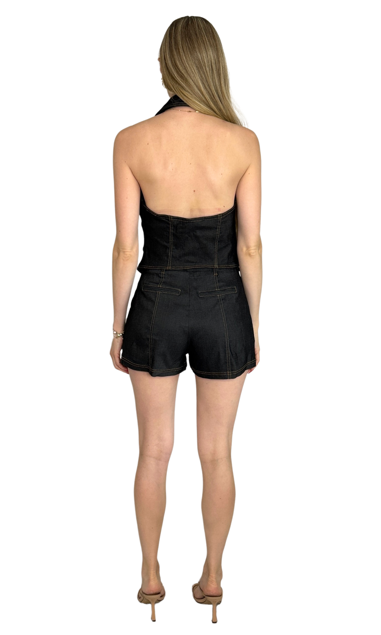 Denim-like two-piece set featuring a halter neck vest and high-waisted shorts, designed for a polished yet comfortable look perfect for versatile occasions.