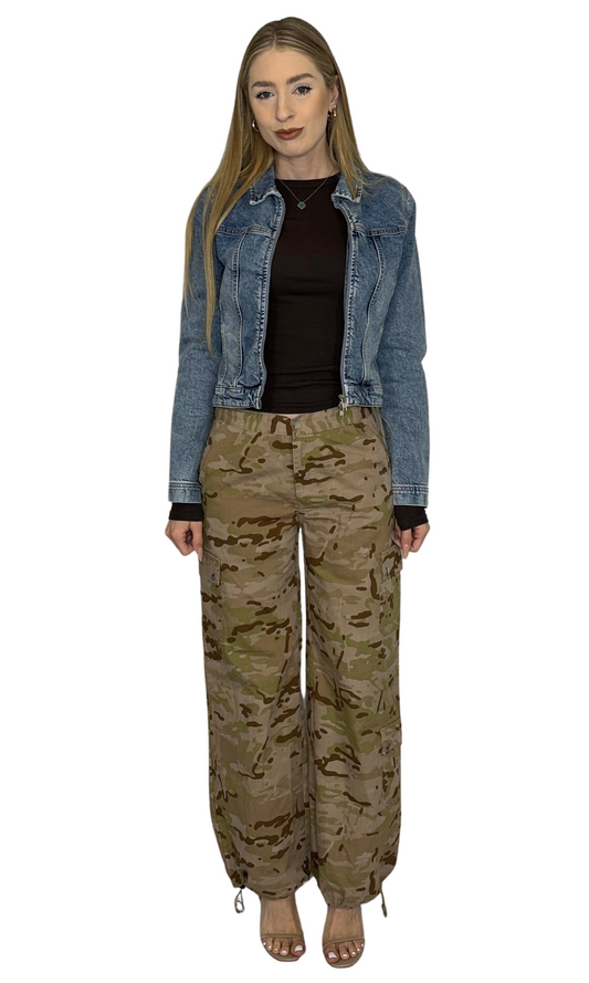 Women's low-waisted camo cargo pants with bungee ties at waist and ankles – adjustable fit and versatile streetwear staple