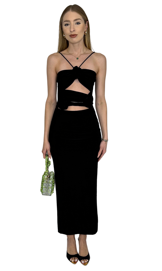 Black midi dress with front cutout, rose accents, and back tie straps – romantic and versatile women’s fashion piece