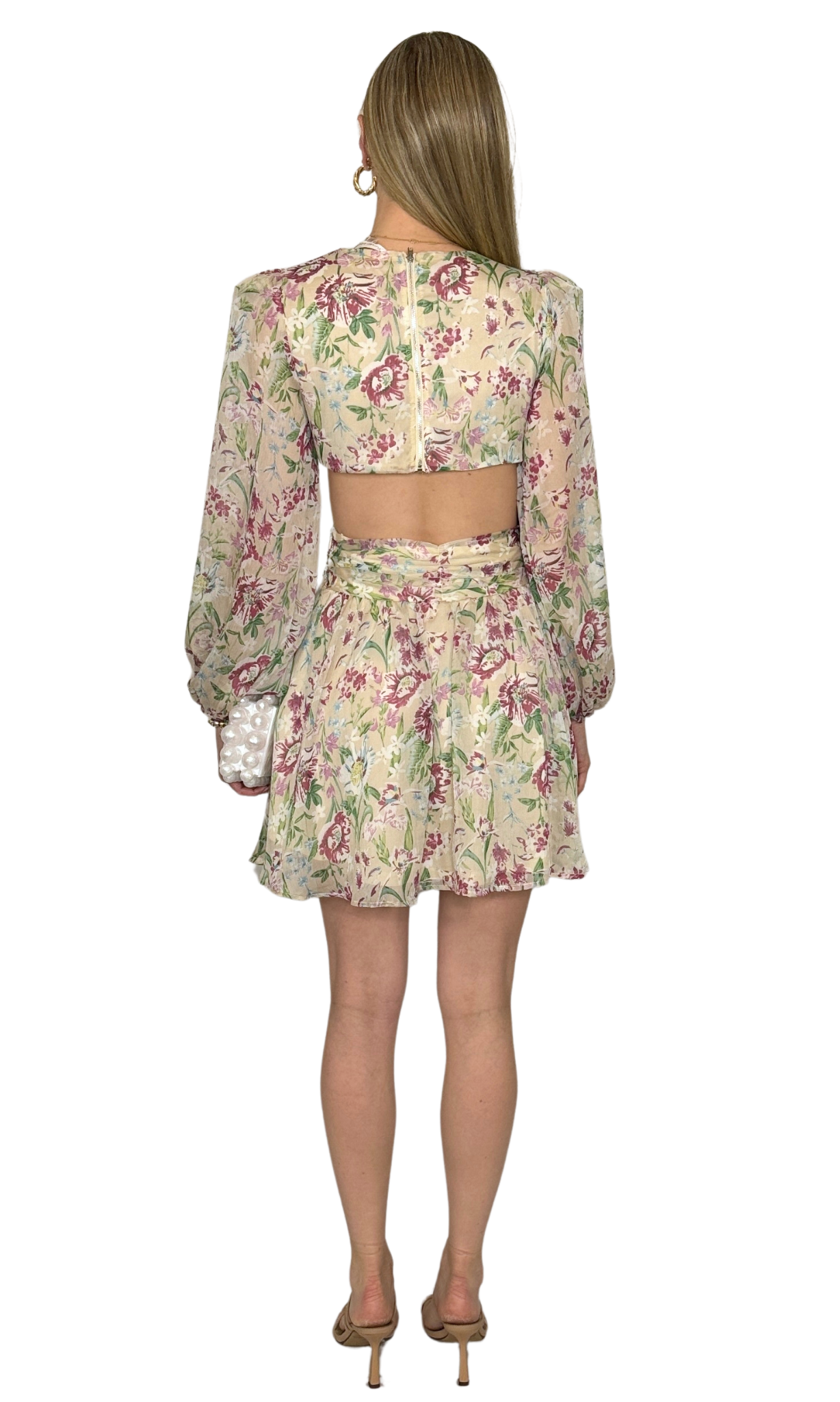 Nude, magenta, and green floral print dress featuring a deep V-front neckline, cut-out sides, hidden skirt zipper, and back panel zipper, showcasing a vibrant and intricate pattern perfect for special occasions.