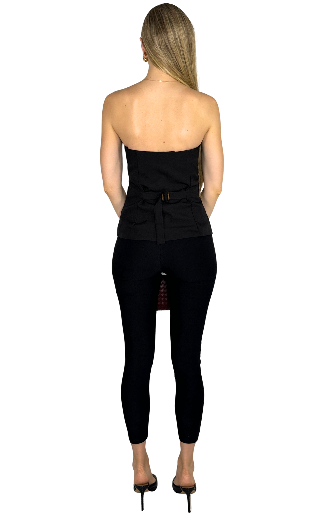 Gemma black fitted skinny pants featuring high-waisted pull-on style and front ankle zipper details for a sleek, polished look.