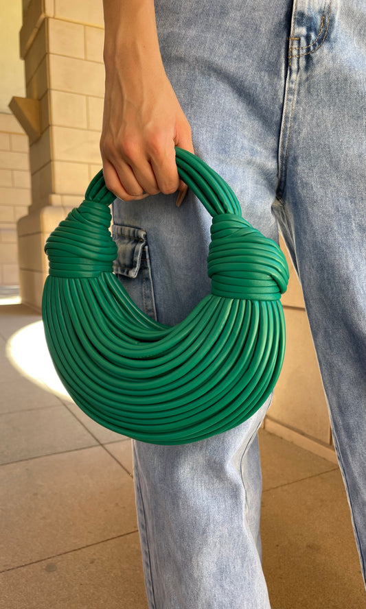 Green top handle bag with built-in zipper pouch, detachable strap, and lightweight casual design for everyday use.