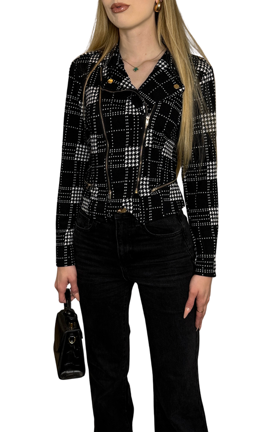 Knit houndstooth print motorcycle jacket with decorative snaps, zipper accents, and a functional front zipper for a stylish day-to-night look.