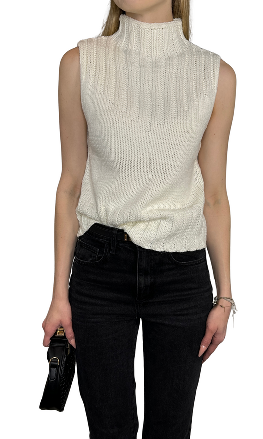 Ivory sleeveless sweater top featuring a sophisticated high neckline, designed for a refined and elegant look — the Cindy Sweater, perfect for elevating any outfit.