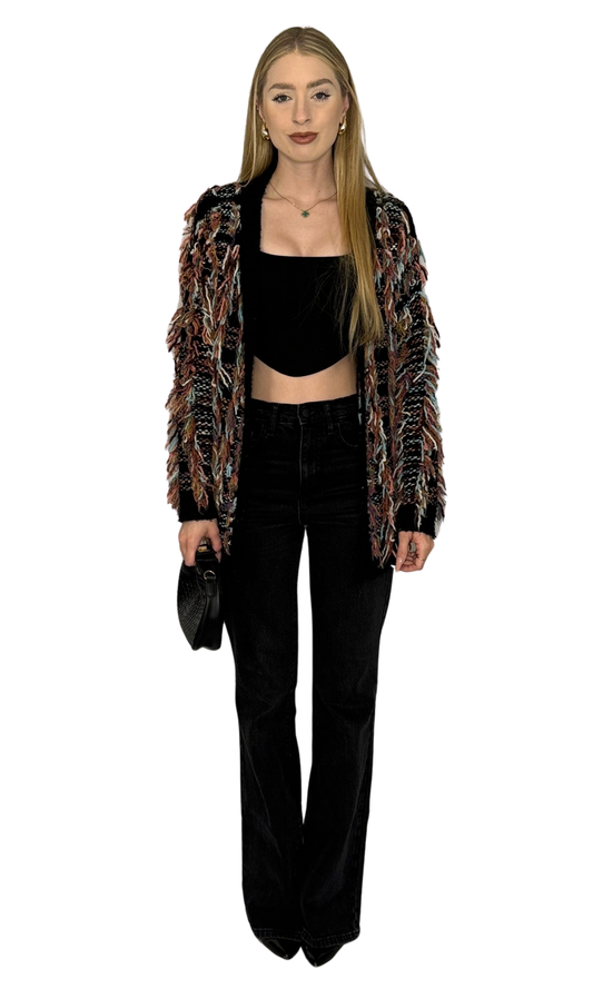 Multicolor open-front cardigan with fringe details and thick fabric for warmth and layering.