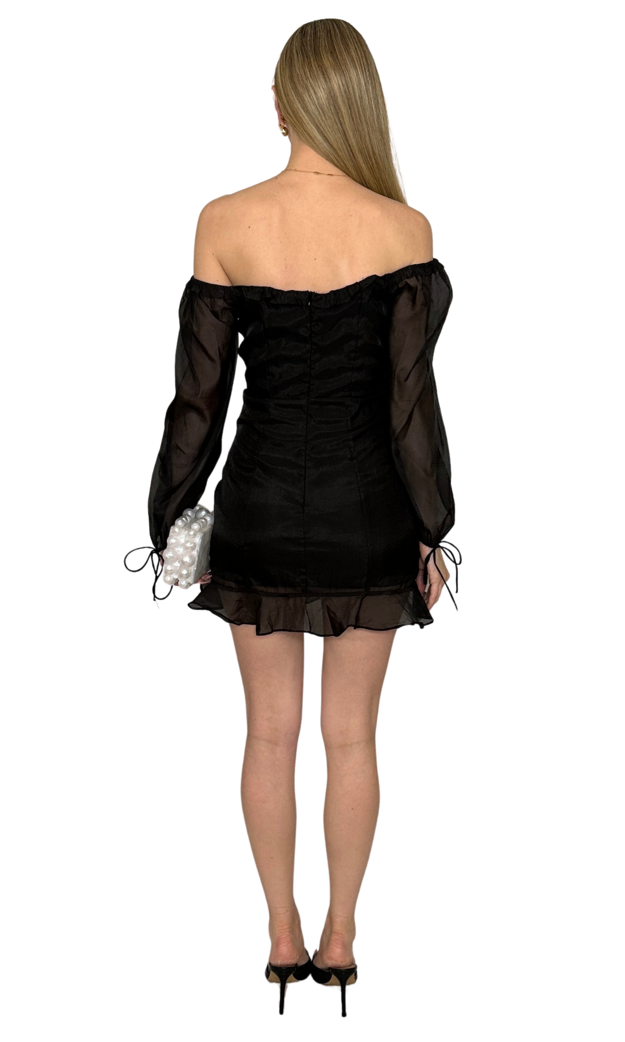 Off-the-shoulder black organza semi-sheer dress featuring lace-up front detail, ruched skirt with ties, balloon sleeves with ruffle and ties, and center back zipper, perfect for a timeless romantic look.