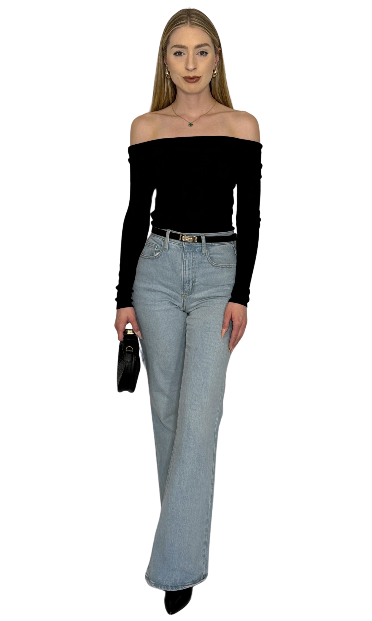 Solid black off-the-shoulder sweater top featuring a fold over neckline and long fitted sleeves, crafted from soft sweater knit fabric for a luxurious and elegant look — the Vanessa Top.