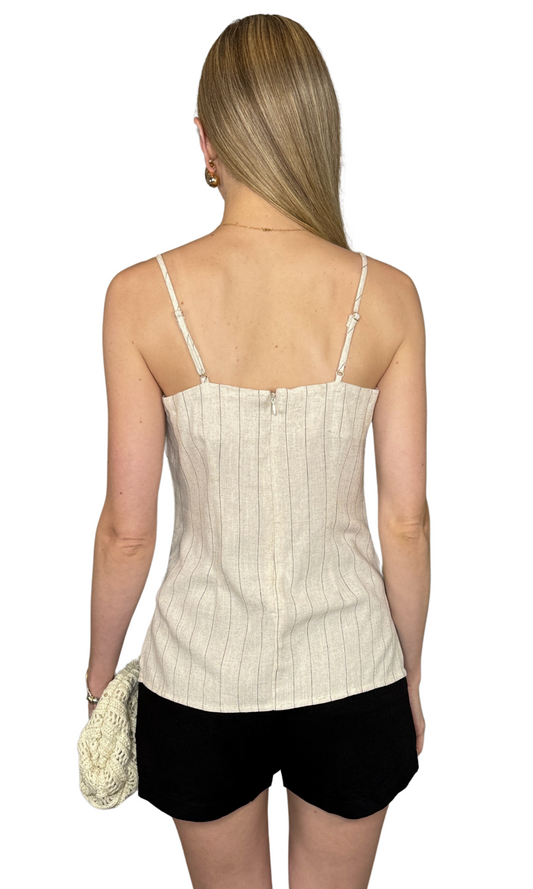 Sleeveless pinstripe cami featuring a square neckline, adjustable spaghetti straps, and a back zipper closure, crafted from a linen blend fabric for a flattering and effortlessly elegant look — the Yara Cami.