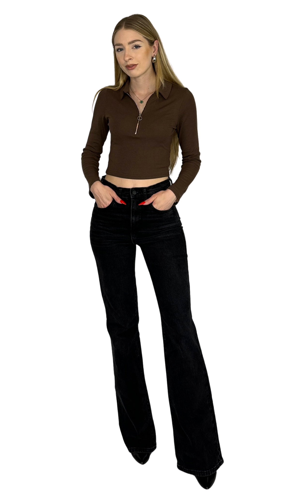 Long sleeve crop top made from soft, ribbed fabric featuring a front zipper for adjustable fit and added convenience.