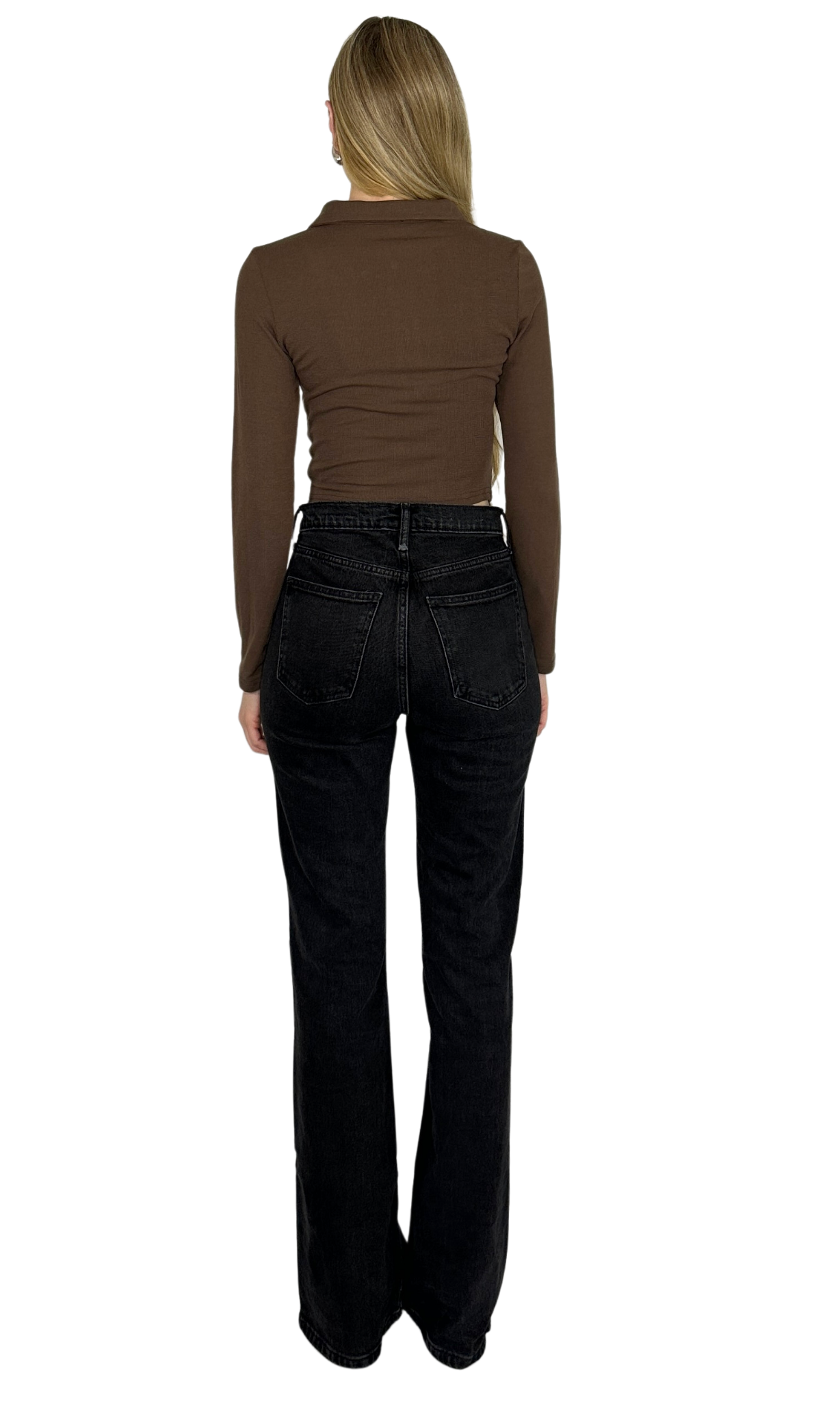 Long sleeve crop top made from soft, ribbed fabric featuring a front zipper for adjustable fit and added convenience.