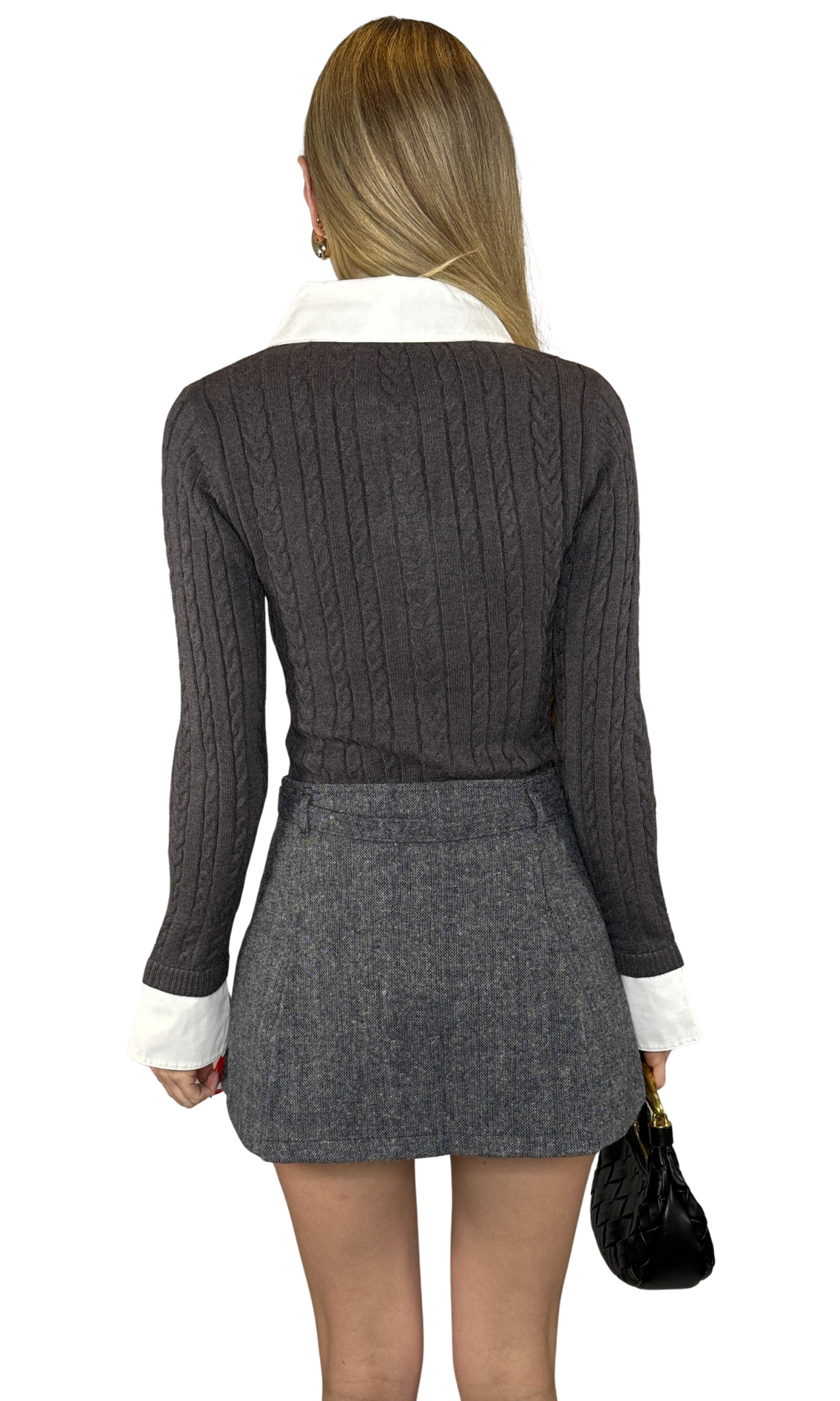 Tatum Tweed Mini Skirt featuring a high-waisted belted design, box pleats, marled tweed fabric, side zipper with hook-and-eye closure, and full lining for comfort and structure.