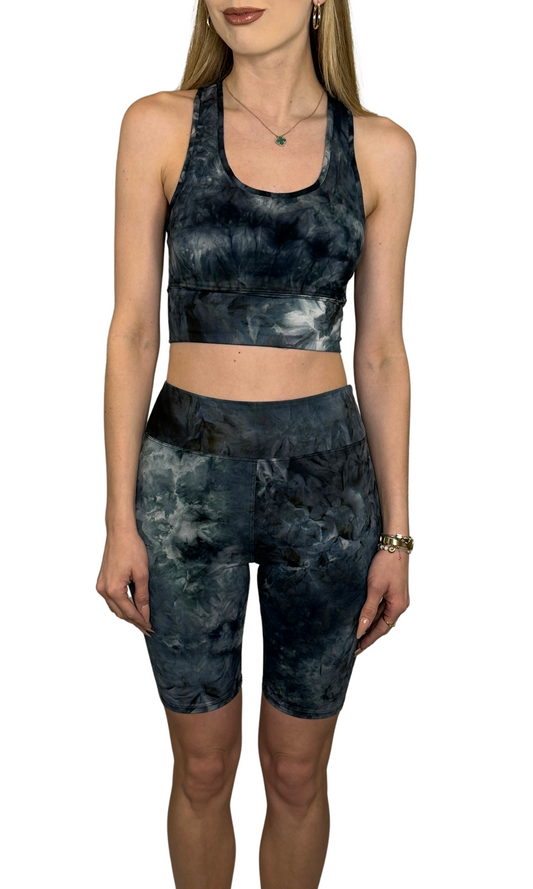 Women's matching tie-dye workout set with biker shorts and sports bra – soft stretchy activewear ideal for yoga, running, and fitness routines