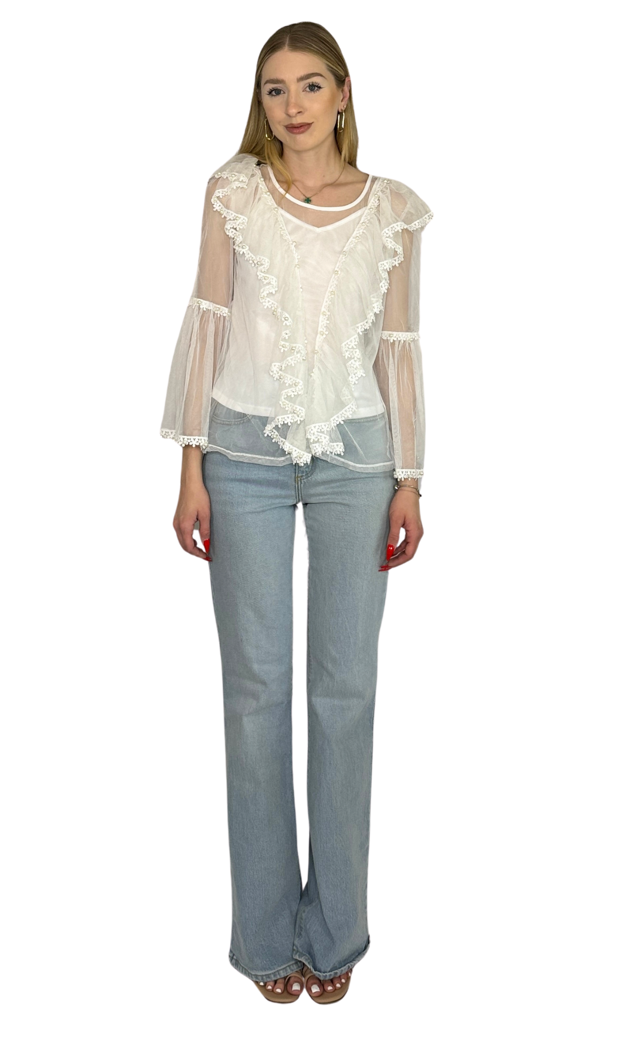 White embroidered top featuring pearl accents on the sleeves and body, paired with a white shell for added coverage and breathable all-day comfort.