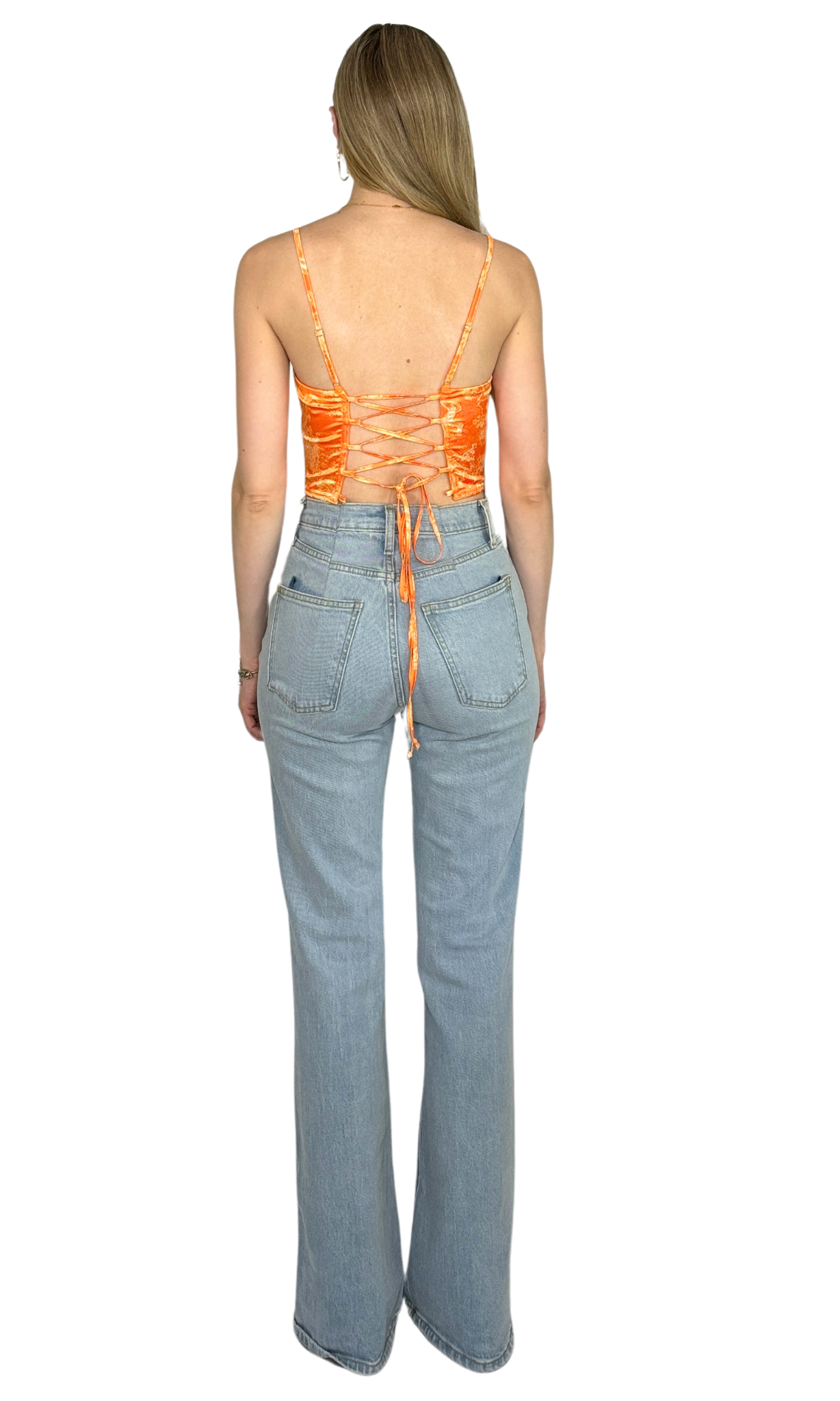 White and orange printed corset top crafted from lightweight fabric, featuring structured boning and a lace-up back for a flattering, statement-making fit.