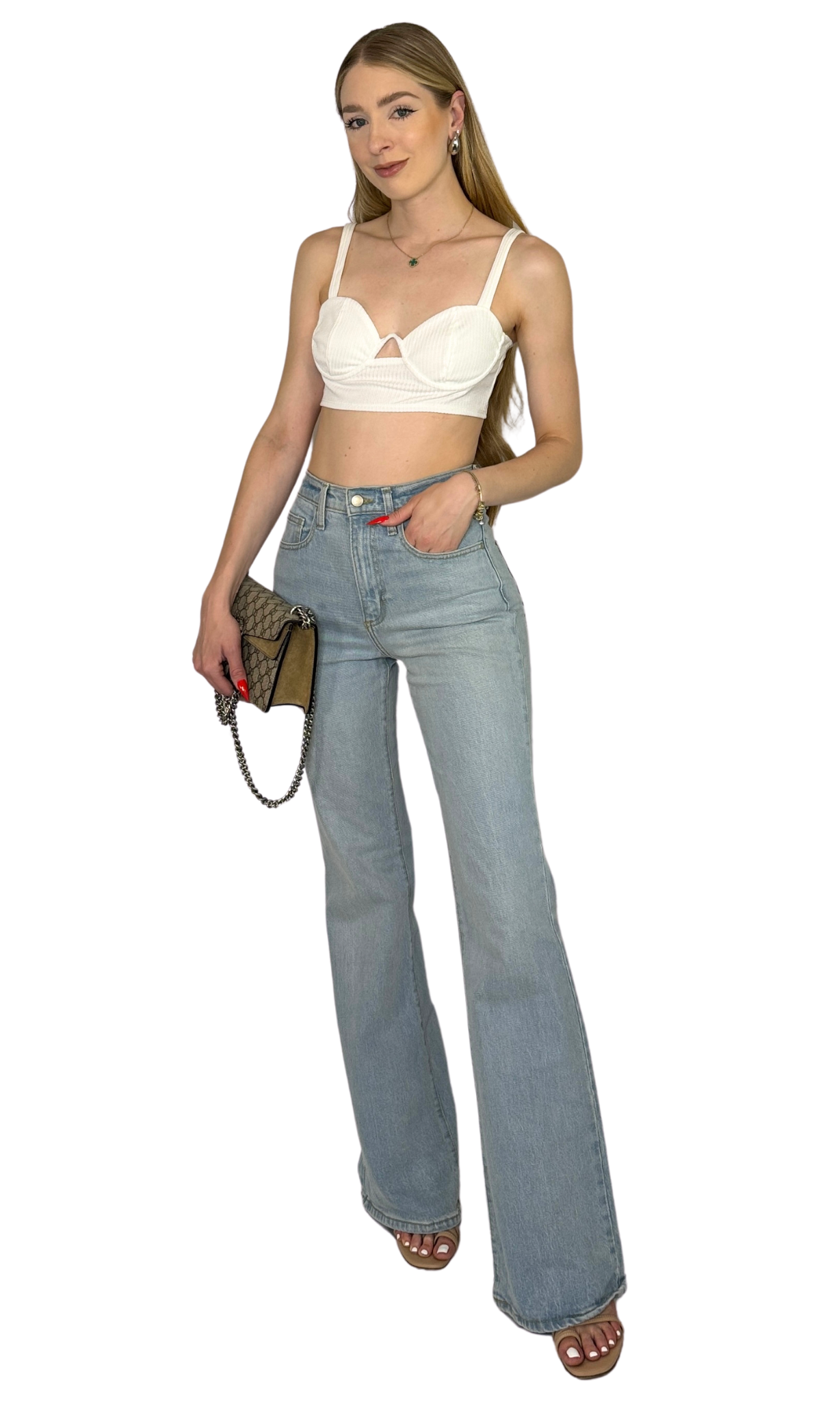 White ribbed knit bra top with adjustable straps, underwire structure, and cut-out detail for comfort and feminine style.