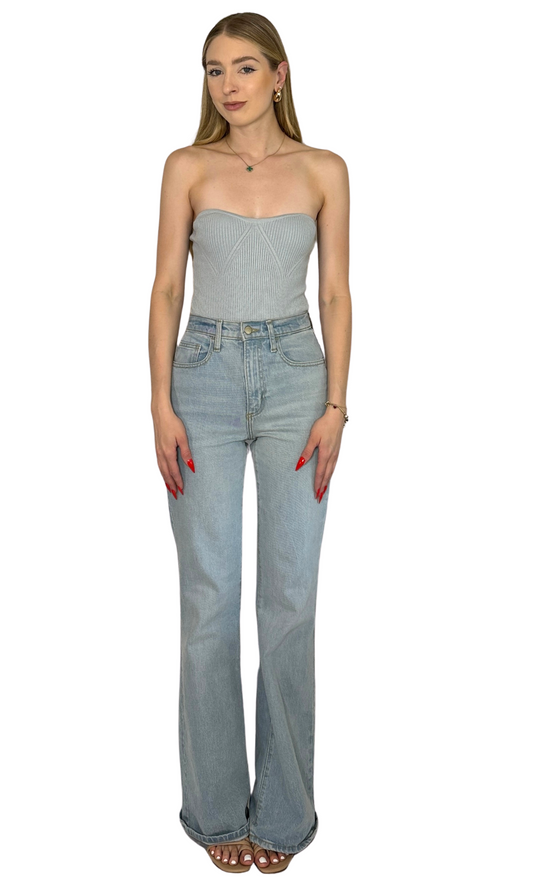 Baby blue ribbed knit strapless bodysuit with thong snap closure, made from soft and breathable fabric for all-day comfort.