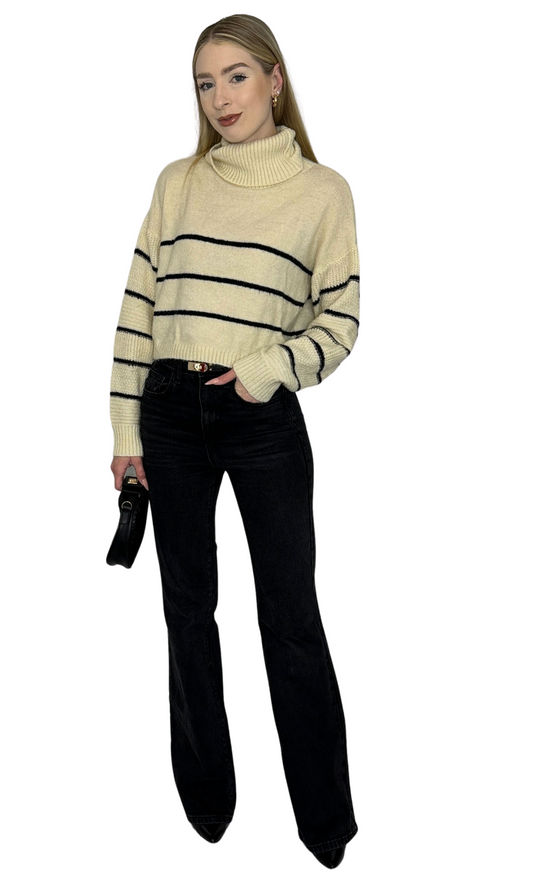 Beige and black striped turtleneck sweater crafted from high-quality materials, offering a timeless and elegant design — the Stephanie Sweater.