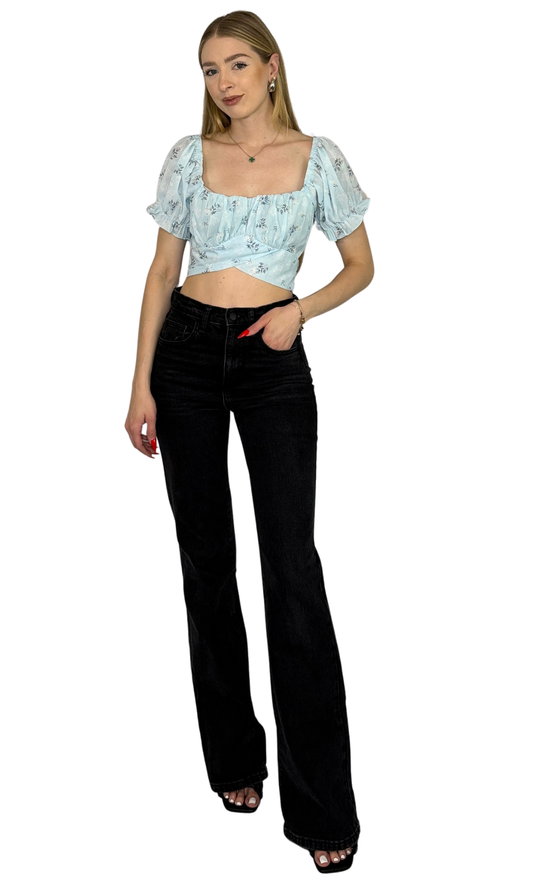 Blue and white floral print top with puff sleeves, tie-back straps, and a cut-out back detail, crafted from lightweight polyester for a flattering, breezy fit.