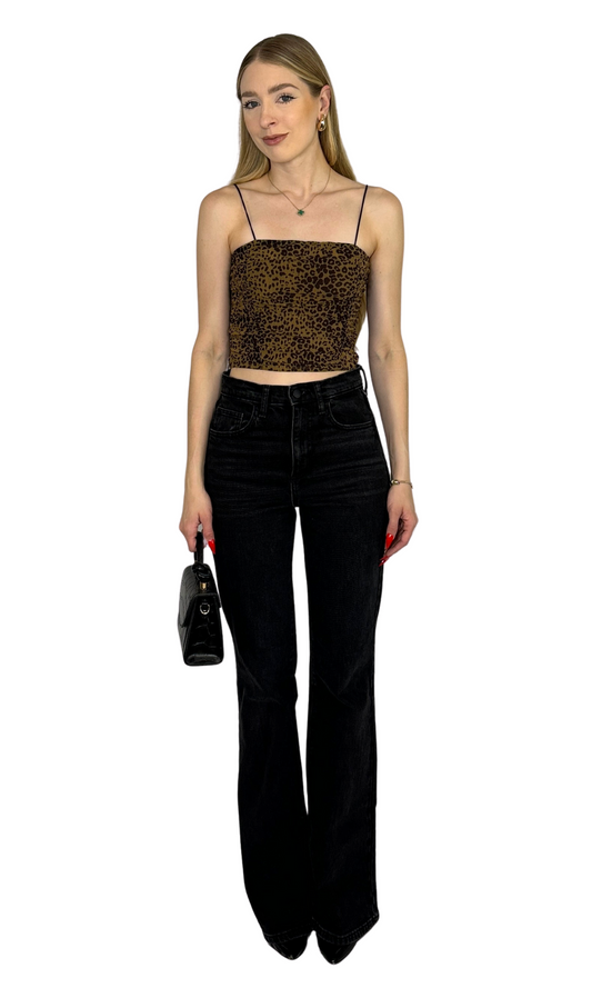 Cheetah printed mesh cami top with ruched detailing and thin black straps for a flattering and versatile look.