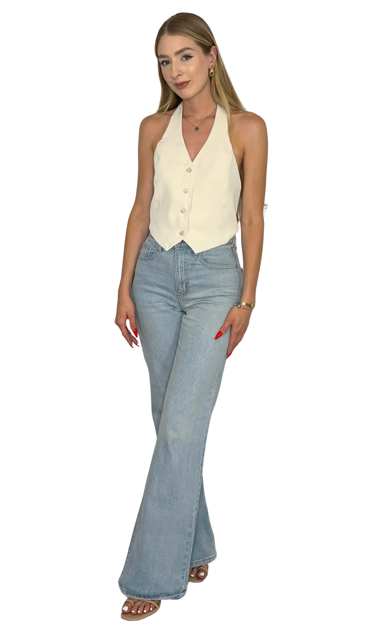 Ellis cream halter vest featuring a deep V-neckline, button-up front, adjustable halter strap, and cropped cut for a flirty, modern twist on tailored style.