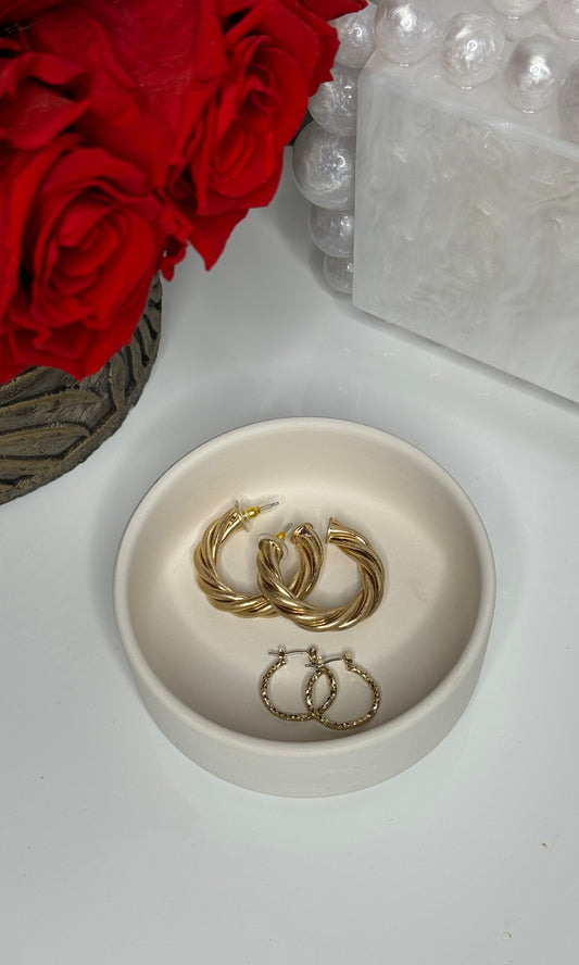 Gold-plated hand-hammered thin hoop earrings with textured finish, perfect for a sophisticated day-to-night look.