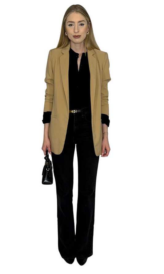 Taupe oversized tailored blazer with rolled sleeves and front pockets, designed for a versatile and stylish fit.