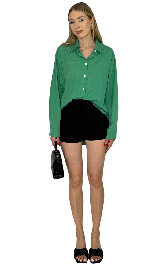Kennedy button down shirt in vibrant green, featuring a high-low hem with a longer back, single chest pocket, and classic collar for effortless everyday style.