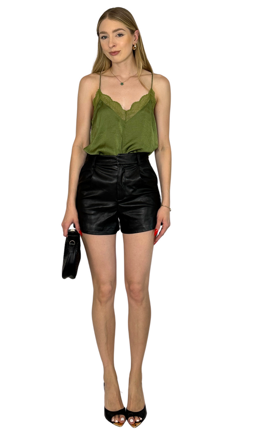 Spaghetti strap cami with lace details on the front and back, designed for comfortable and stylish day-to-night wear.