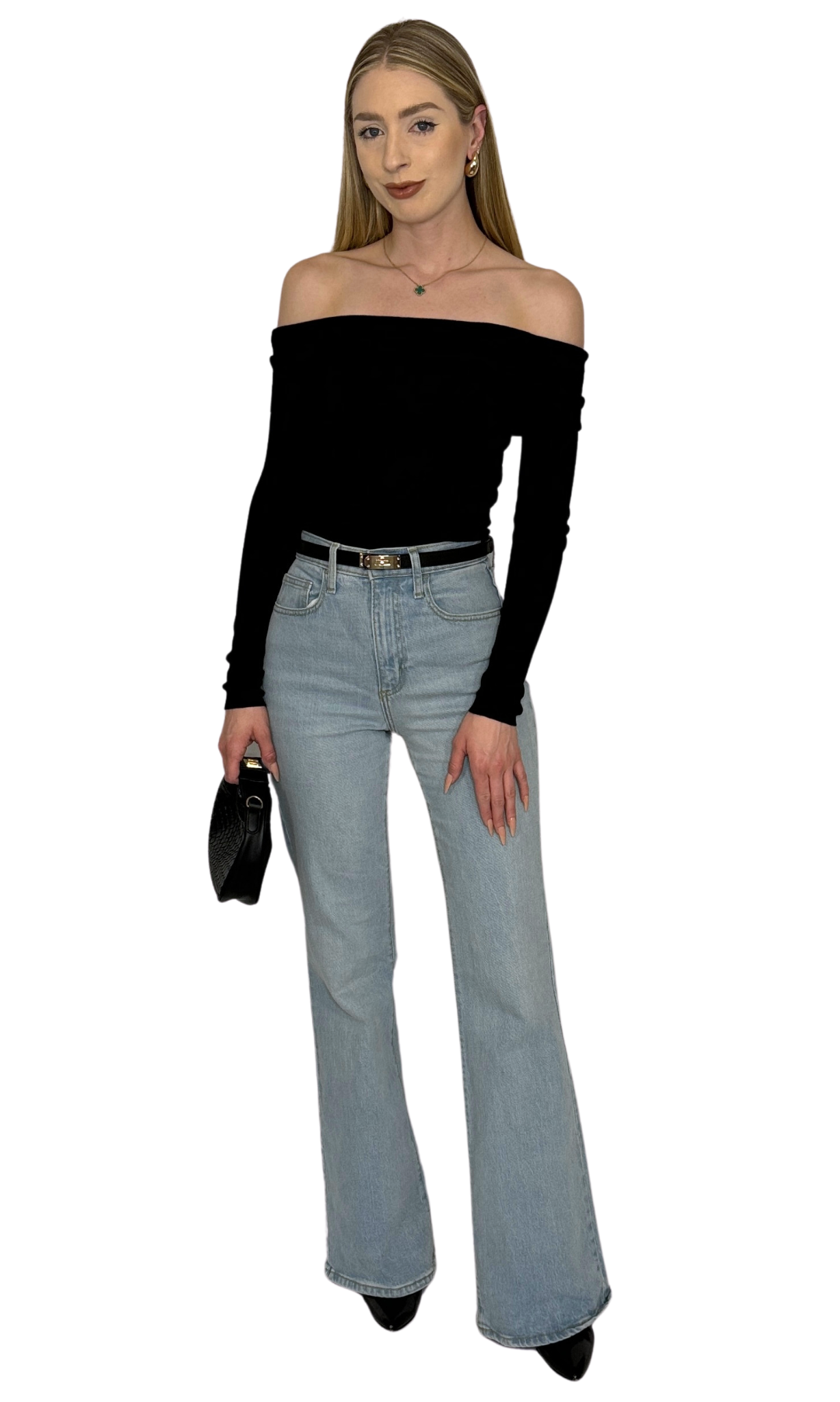Solid black off-the-shoulder sweater top featuring a fold over neckline and long fitted sleeves, crafted from soft sweater knit fabric for a luxurious and elegant look — the Vanessa Top.