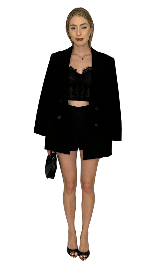 Sheer black lace corset-style tank top featuring lace details along the bust, underwire support, adjustable straps, and a side zipper for a fitted, confident look.