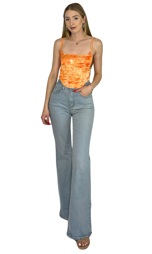 White and orange printed corset top crafted from lightweight fabric, featuring structured boning and a lace-up back for a flattering, statement-making fit.