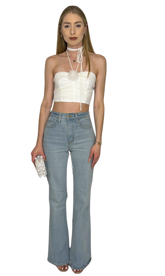 White ruched mesh top featuring delicate flower trim and elegant halter neck ties, offering a sophisticated and exclusive look — the Fleur Mesh Top.