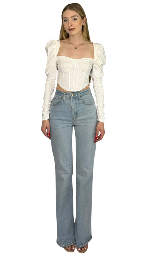 White square neck corset-style top made from soft brushed fabric, featuring puff shoulders, fitted sleeves, and a form-flattering adjustable waist for comfort and style.